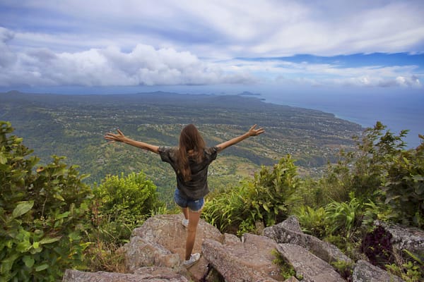 A,Young,Woman,Staying,On,The,Top,Of,The,Hill